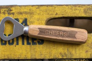 Personalized banner bottle opener